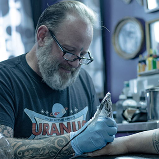 Eric Poland tattoo